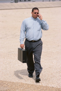 Businessman with cell phone.jpg
